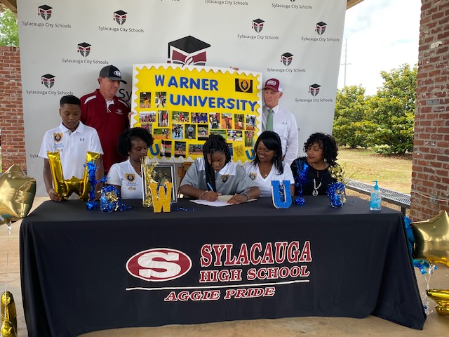 Two SHS softball standouts officially sign to continue playing career